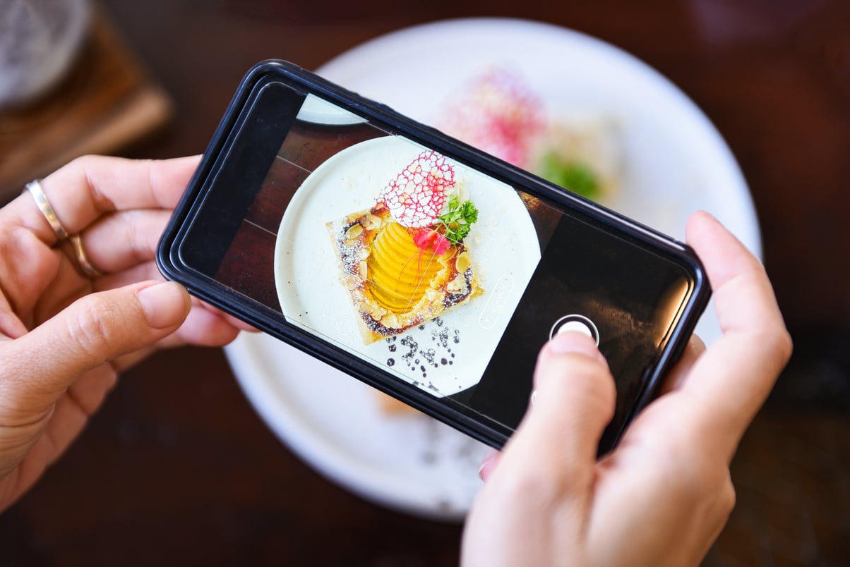 Woman Hands Take Photo of Cake 